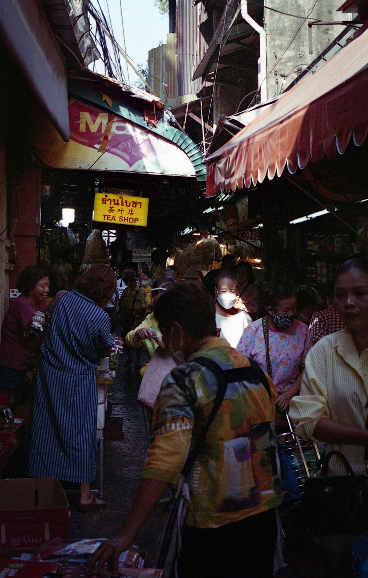 Crowded market near Chinatown in Bangkok Thailand 35mm film photography