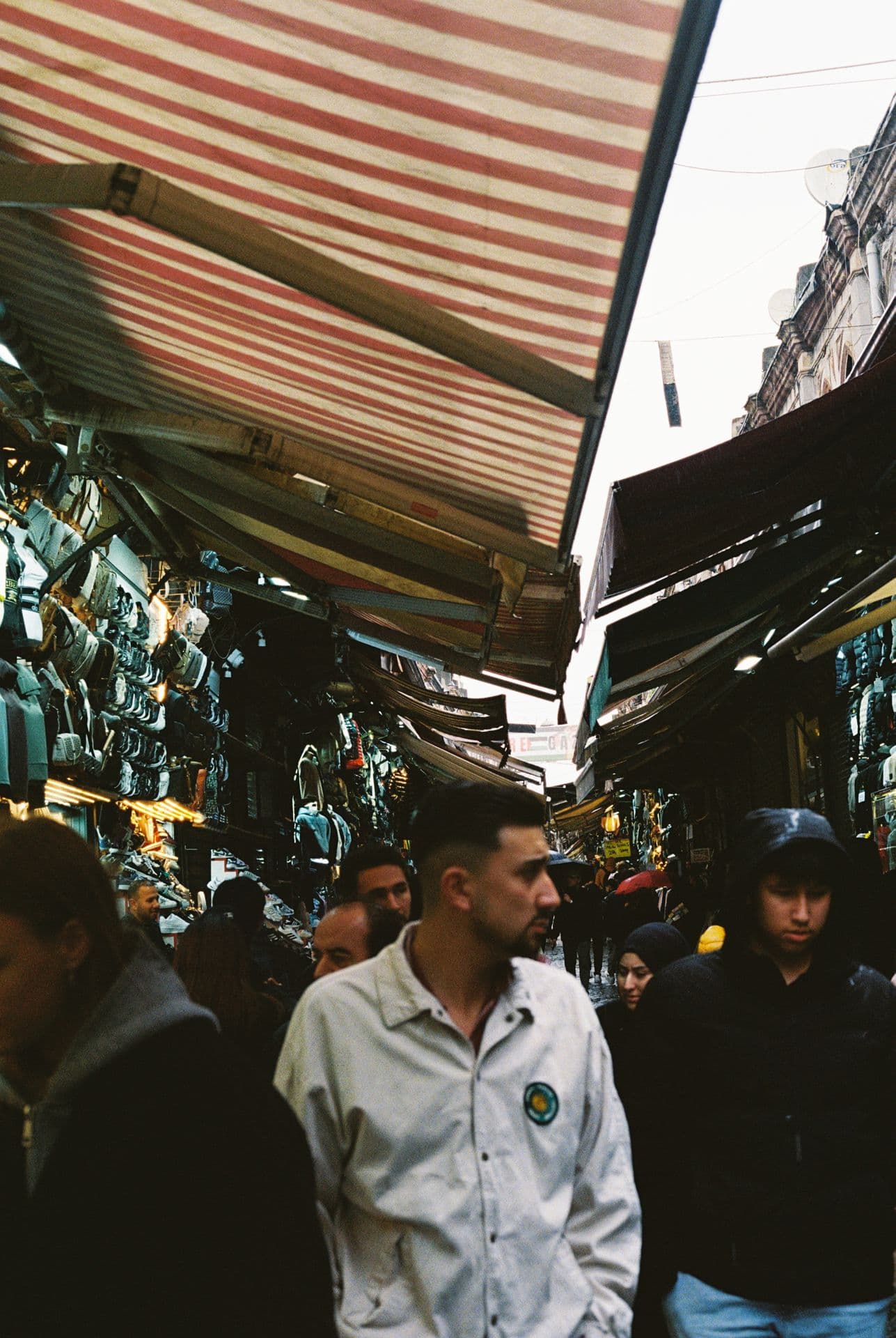 Young man at the market in Istanbul Turkiye 35mm film photography